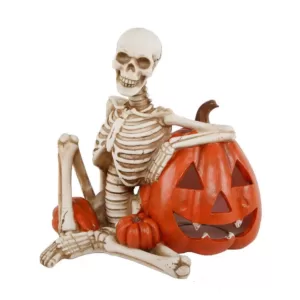 Flora Bunda 9 in. x 7 in. Halloween Lighted Polyresin Skeleton and Orange Pumpkin with Color Changing LED Lights