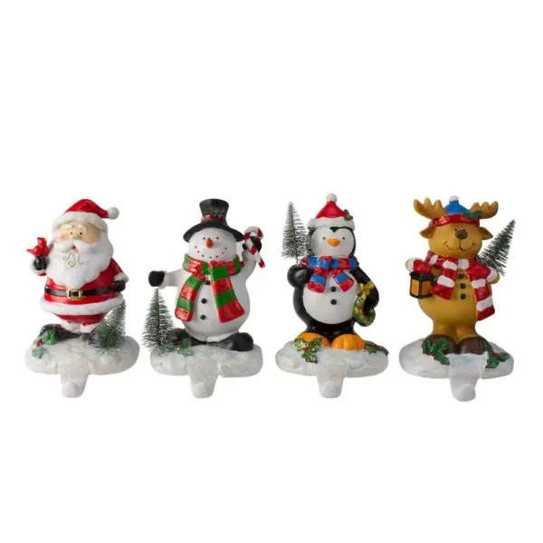 Northlight 5.75 in. Plastic Santa Snowman Penguin and Reindeer Christmas Stocking Holders (Set of 4)